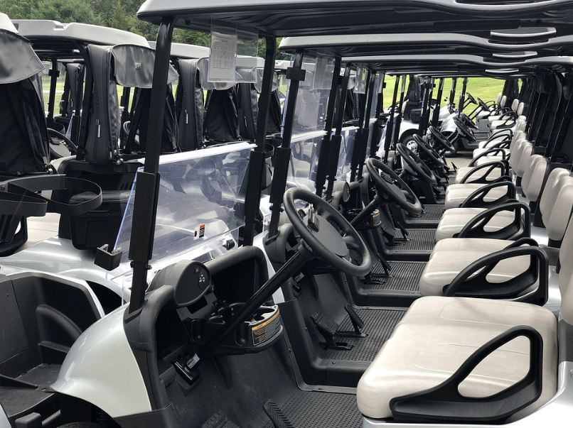 electric golf carts lined up